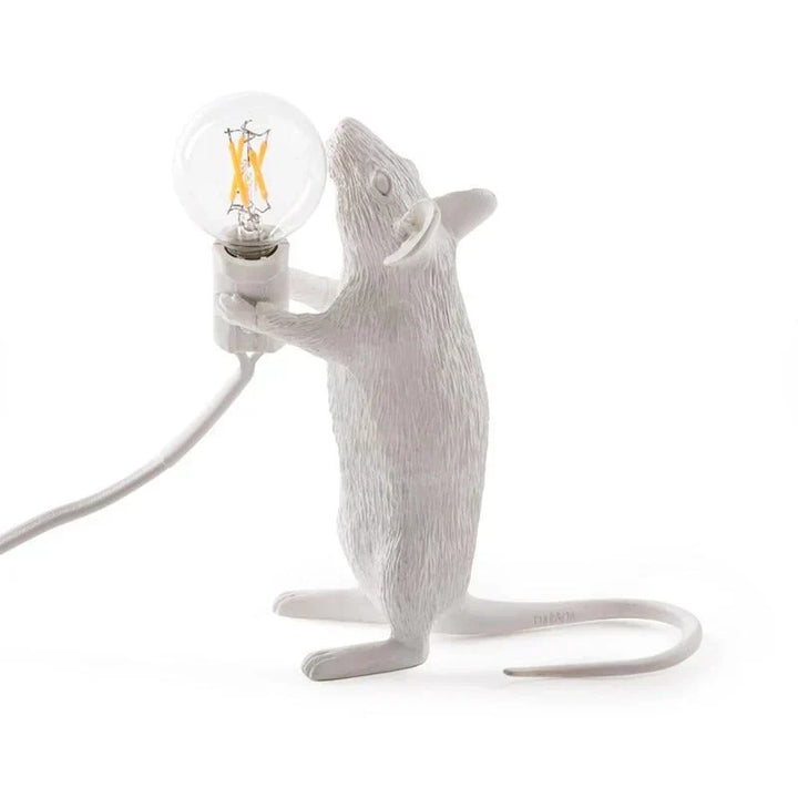 Whimsical gold mouse accent lamp, a charming decorative table light for unique home decor.
