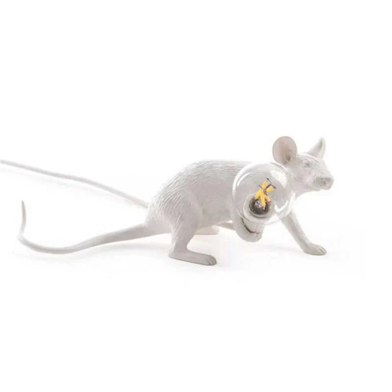 Decorative mouse table lamp in a gold finish, perfect for bedroom or living room light accents.