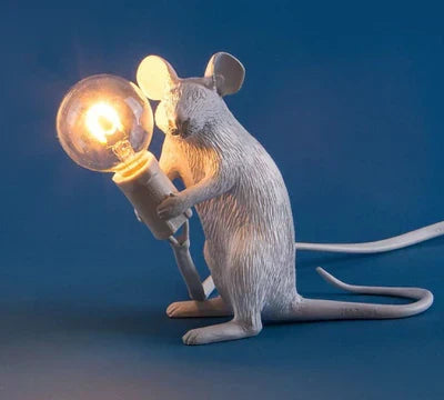 White mouse table lamp, a delightful animal decor accent, perfect for creating a cozy ambiance.