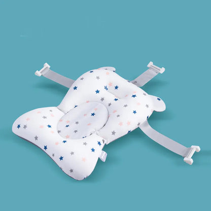 Top-down view of a soft white baby bathing cushion, an ideal newborn bath support
