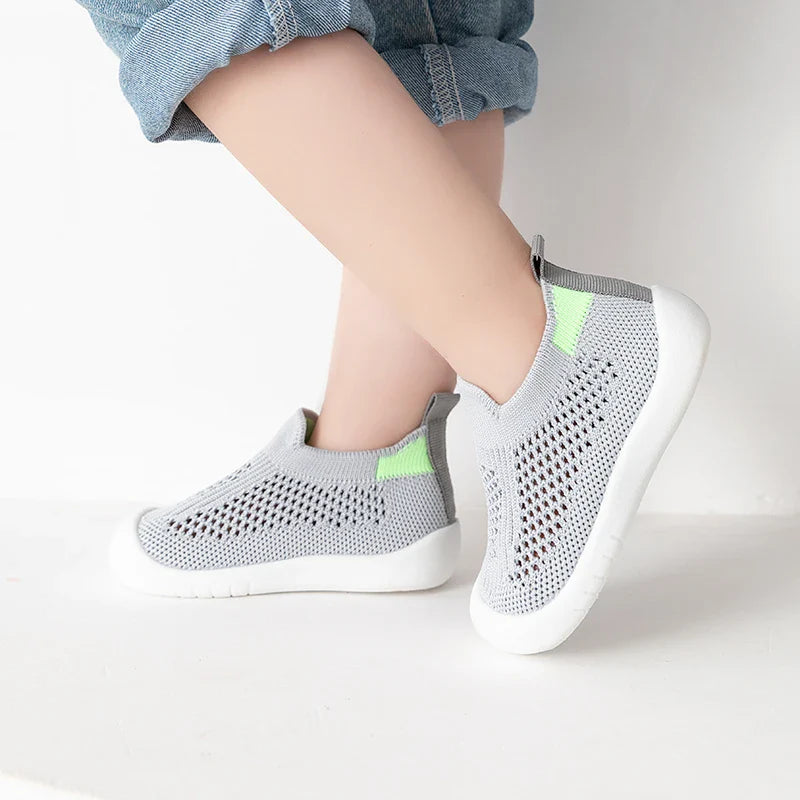 White baby mesh sneakers with subtle pattern, stylish and breathable spring footwear
