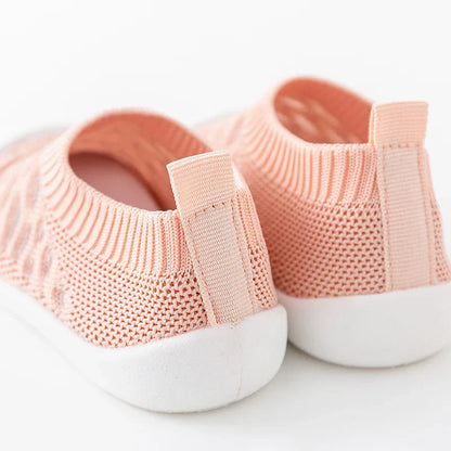 Close-up of the stitching on baby mesh sneakers, durable and breathable construction