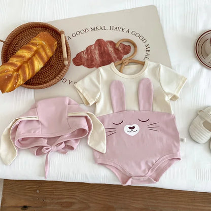Baby gift set: white cotton bodysuit onesie with cap, ideal for newborn essentials.