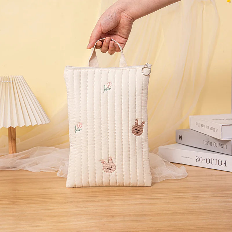 Organizational cotton diaper bag, interior compartments for tidy storage of baby items