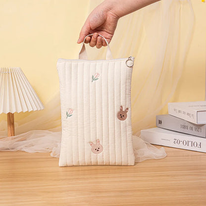 Organizational cotton diaper bag, interior compartments for tidy storage of baby items