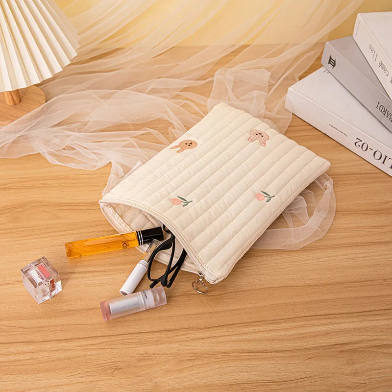 Baby cotton bag with a secure, wipeable lining, perfect for baby's travel needs