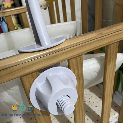 Compact baby mobile holder with music box, universal clamp design for on-the-go or home