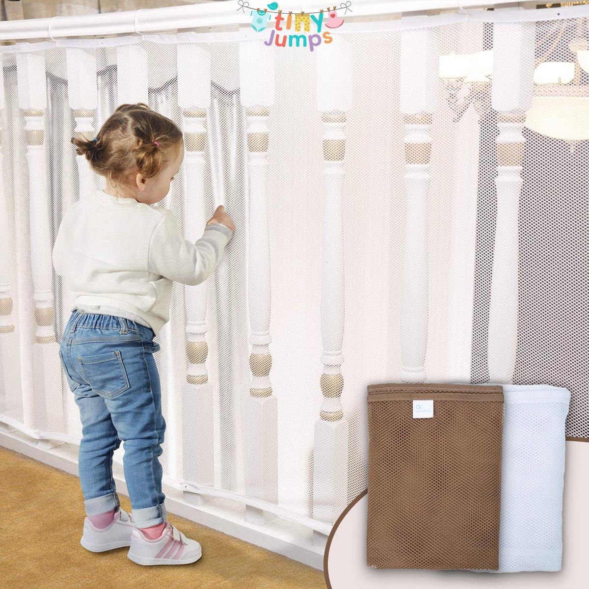 Baby safety net securing an indoor staircase railing, ideal for toddler safety and home safety.