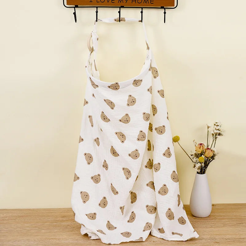 Breathable cotton muslin blanket covering a baby in a stroller, sun protection.