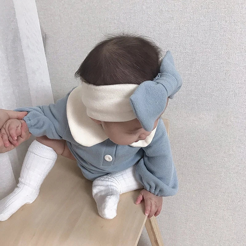 Organic cotton baby bodysuit, long sleeve with a simple white Peter Pan collar