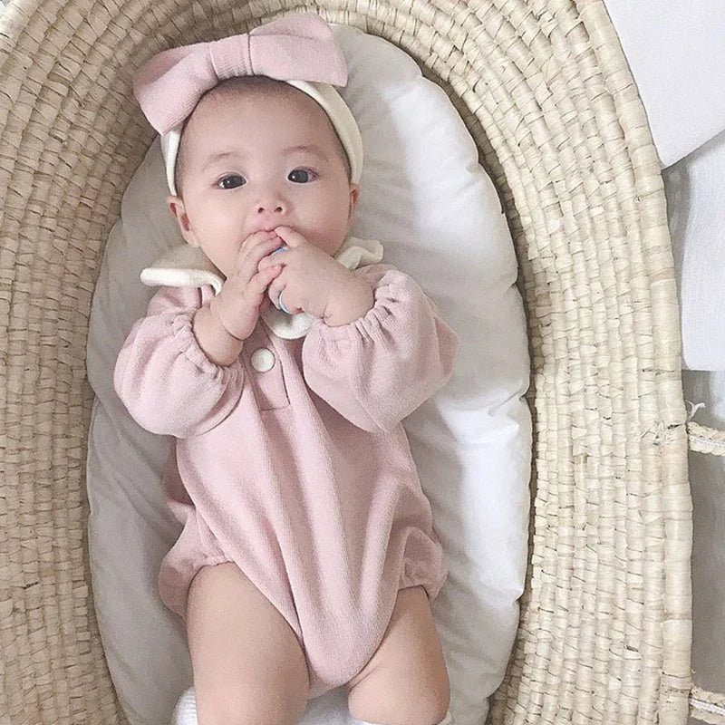 Baby girl clothing: adorable Peter Pan collar bodysuit with ruffled cuffs