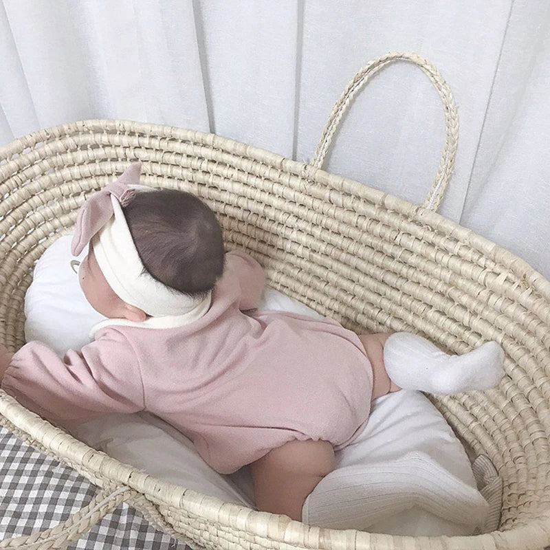 High-quality cotton baby bodysuit, durable and soft, designed with a Peter Pan collar