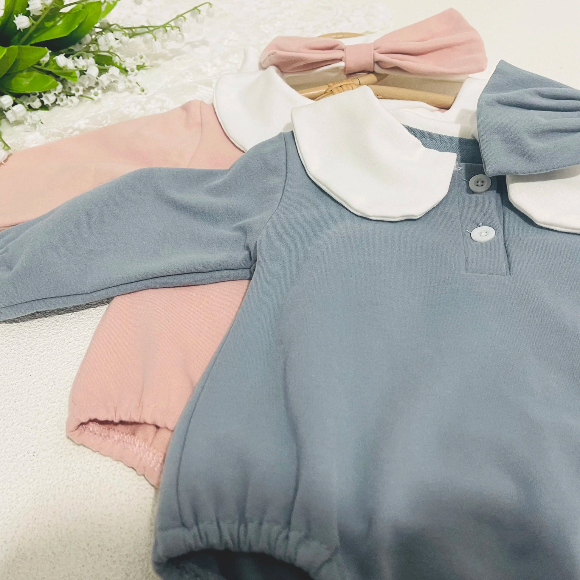Cotton long sleeve baby bodysuit, elegant gray with a crisp white Peter Pan collar