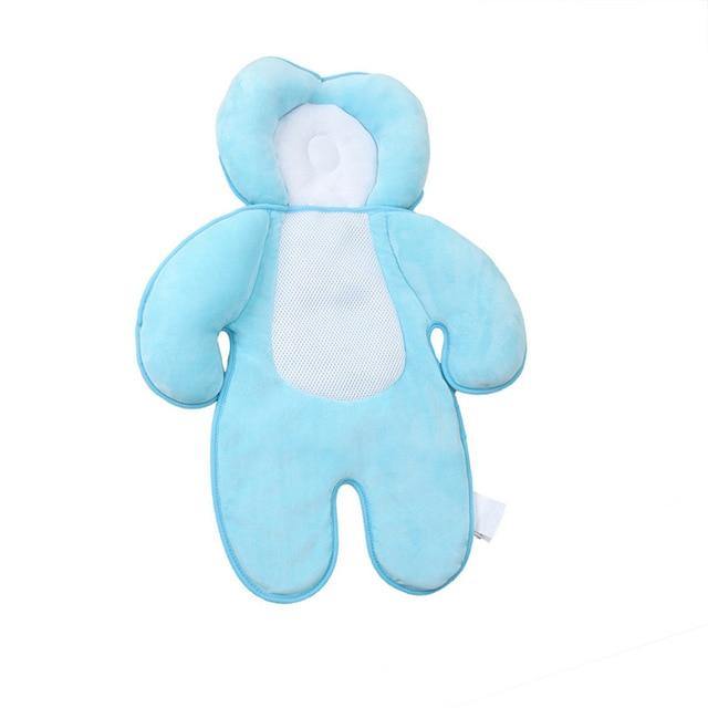 Infant head positioning pillow, white, for use in strollers and cribs to support baby's head