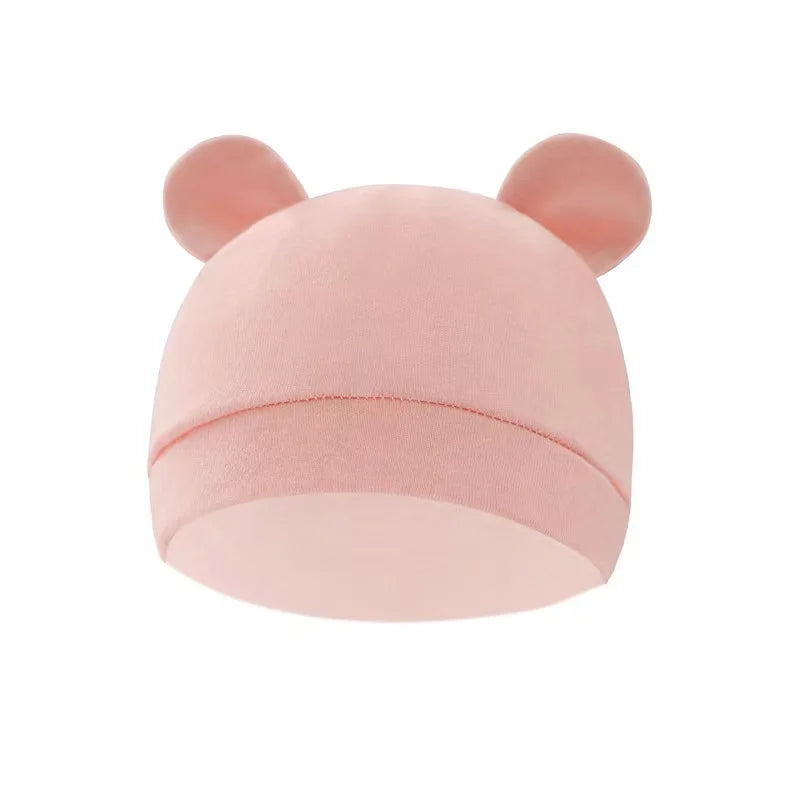 Cozy cotton newborn swaddle blanket and matching hat, essential baby item