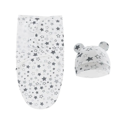 Baby essentials: white cotton swaddle blanket and newborn cap for sleep