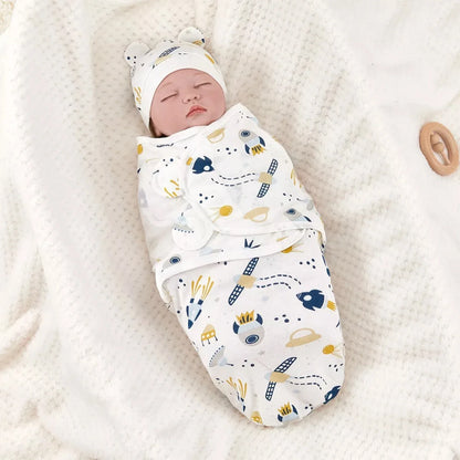Newborn sleeping bag in soft cotton, adjustable fastenings, ideal for baby swaddle and sleep.