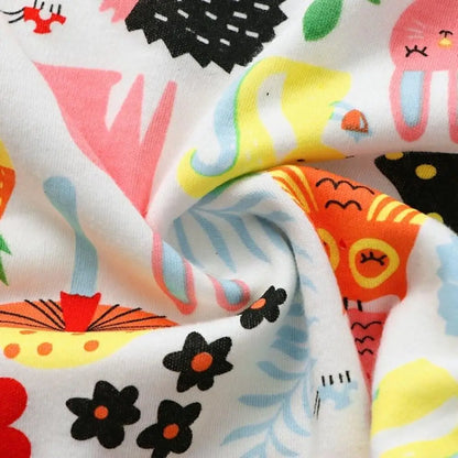 Baby swaddle sleeping bag in organic cotton, pink chevron pattern, for newborn comfort & secure sleep.