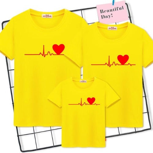 Two children smiling in their 'Family Heartbeat' matching t-shirts, perfect for siblings.