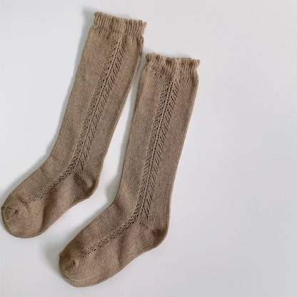 Dark blue knee-high socks, durable cotton, perfect for active kids, breathable design