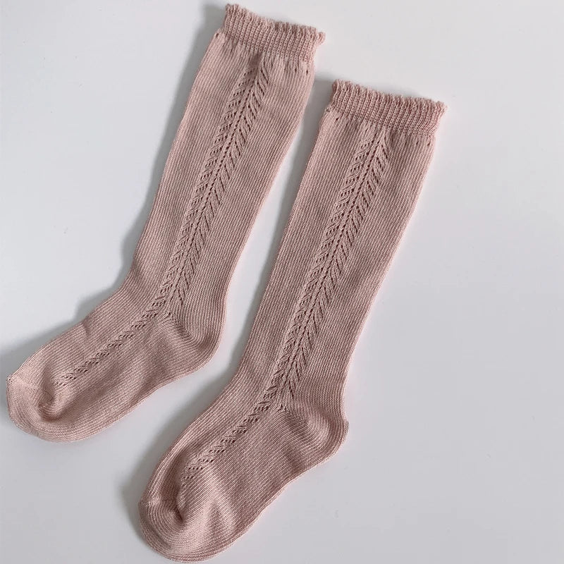 Red kids' knee-high socks, vibrant cotton, stylish children's apparel, comfortable fit