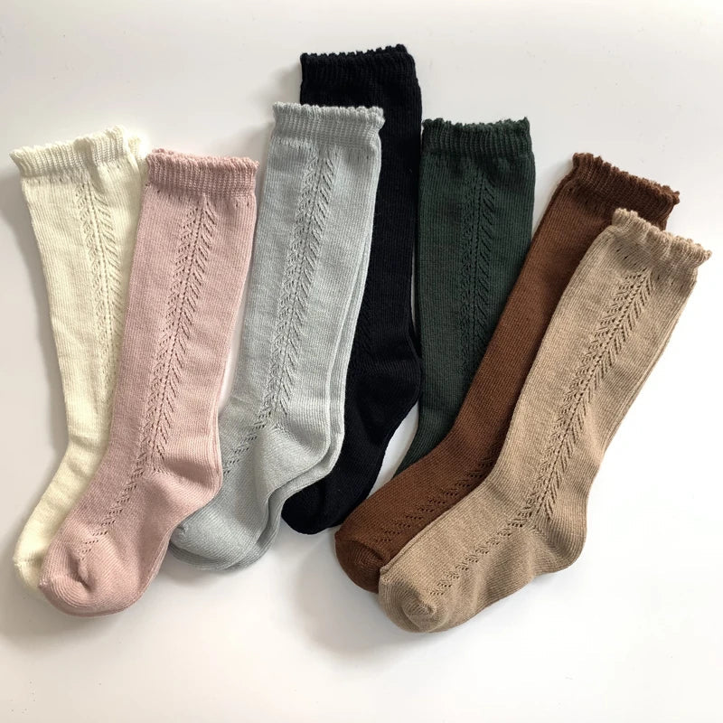 Blue kids' knee-high socks, soft cotton, stylish children's apparel, breathable design