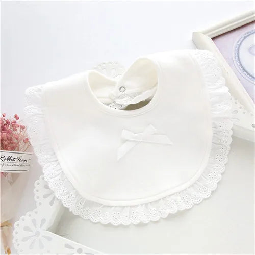 Assortment of colorful cotton lace baby bibs for girls, providing adorable and practical feeding bibs.