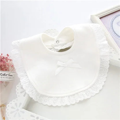 Assortment of colorful cotton lace baby bibs for girls, providing adorable and practical feeding bibs.