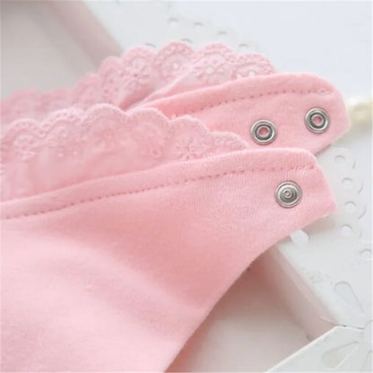 Stack of folded girls' cotton lace baby bibs in various colors, emphasizing the soft texture and quality.
