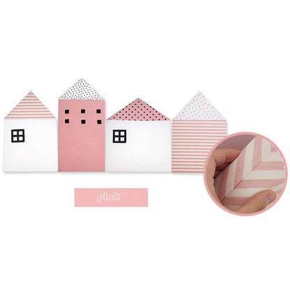 Decorative house-shaped bed rail for toddler safety, blends with nursery room decor