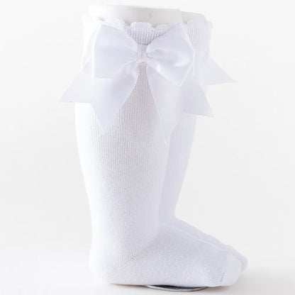 Navy knee-high socks for girls 5-7 years, elegant white bow, durable cotton blend.