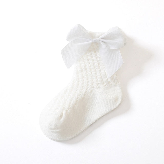 Collection of girls' lace flower tube socks in various colors, stylish and soft