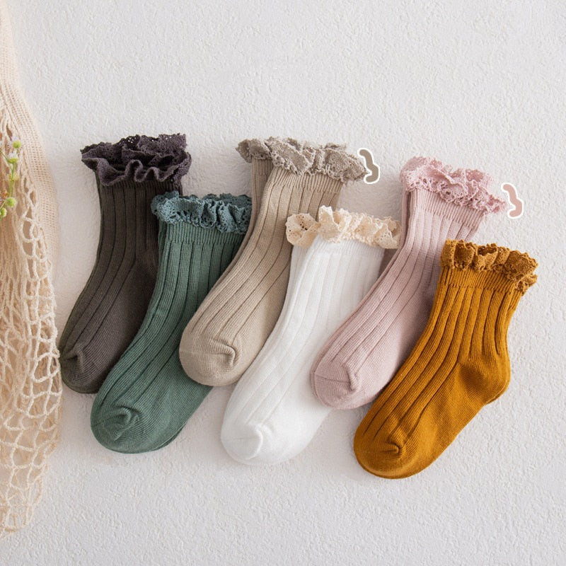 White lace frilly ankle socks for girls, soft cotton, delicate ruffle trim, perfect for toddlers