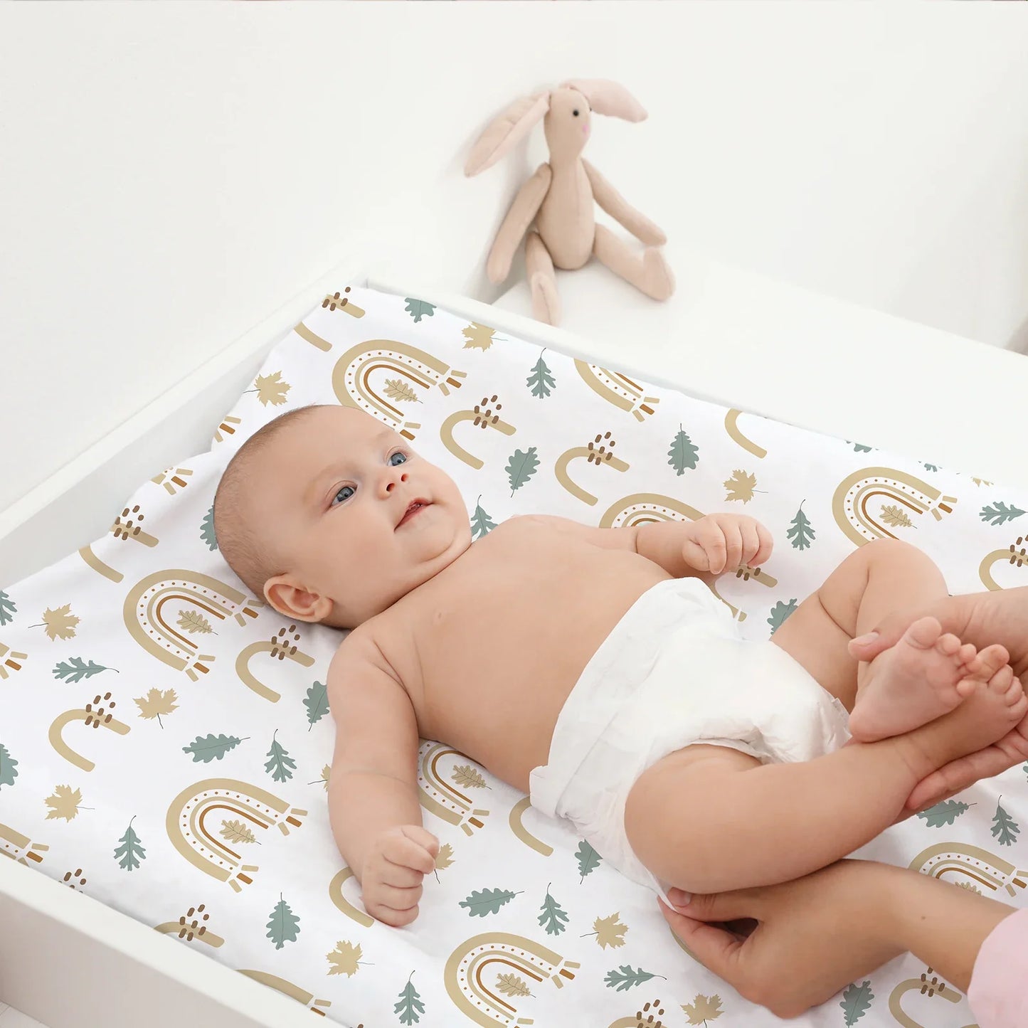 Close-up of soft microfiber bassinet sheet, white, essential baby bedding for crib.