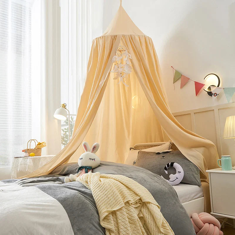 Insect protection: white mosquito net bed canopy, unisex, for serene nursery decor.