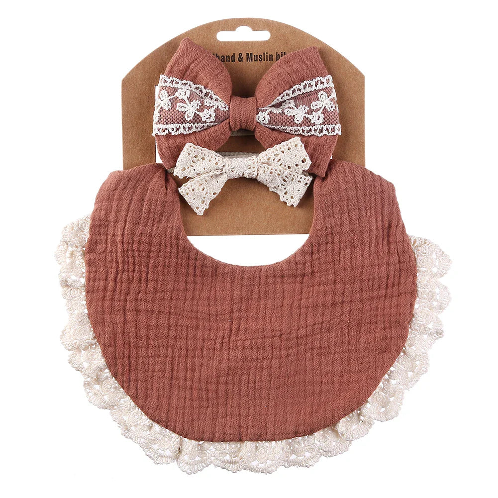 High-quality white muslin cotton baby bib, absorbent and gentle, with a pretty lace headband for baby girls.