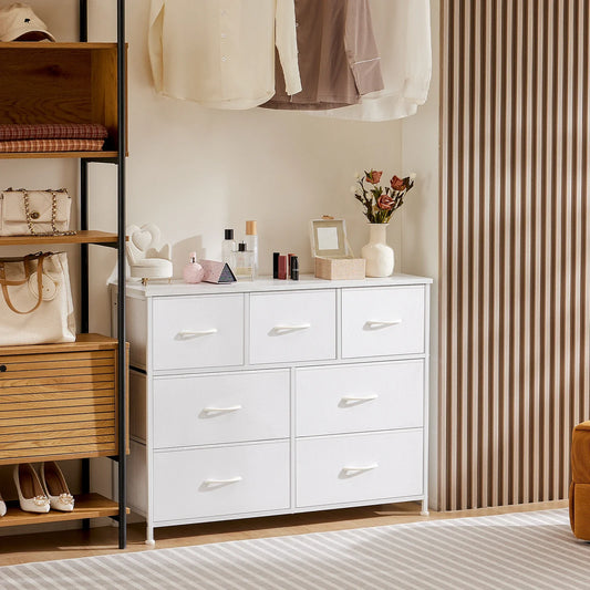 White nursery fabric storage dresser with colorful soft-edge drawers, perfect for baby accessories.