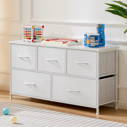 Compact nursery storage dresser, white with soft fabric drawers, essential baby accessory furniture.