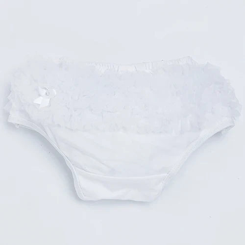 Toddler girl playing in a yellow ruffled diaper cover, durable cotton blend baby shorts