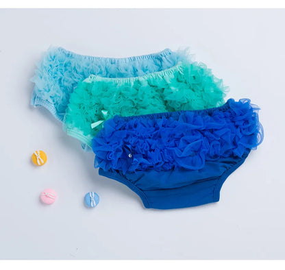 Stacked ruffled diaper covers in multiple colors, soft cotton blend baby bottoms, infant fashion