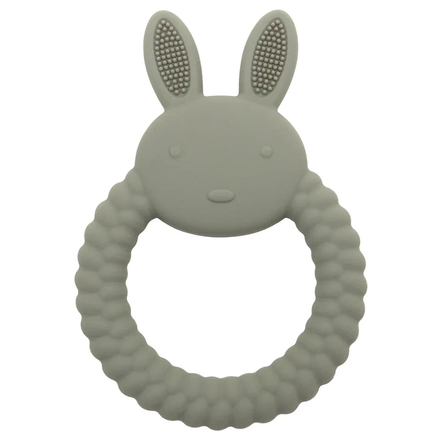 Rabbit shaped silicone teether on a clean surface, hygienic baby relief for teething infants