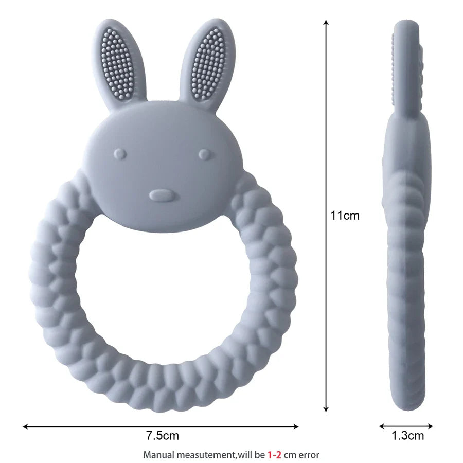 Green rabbit shaped silicone teether with textured ears, helps soothe baby's teething pain