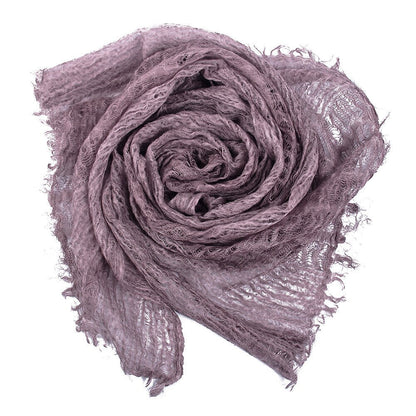 Baby gift set featuring a soft cotton swaddling blanket, essential for newborns.