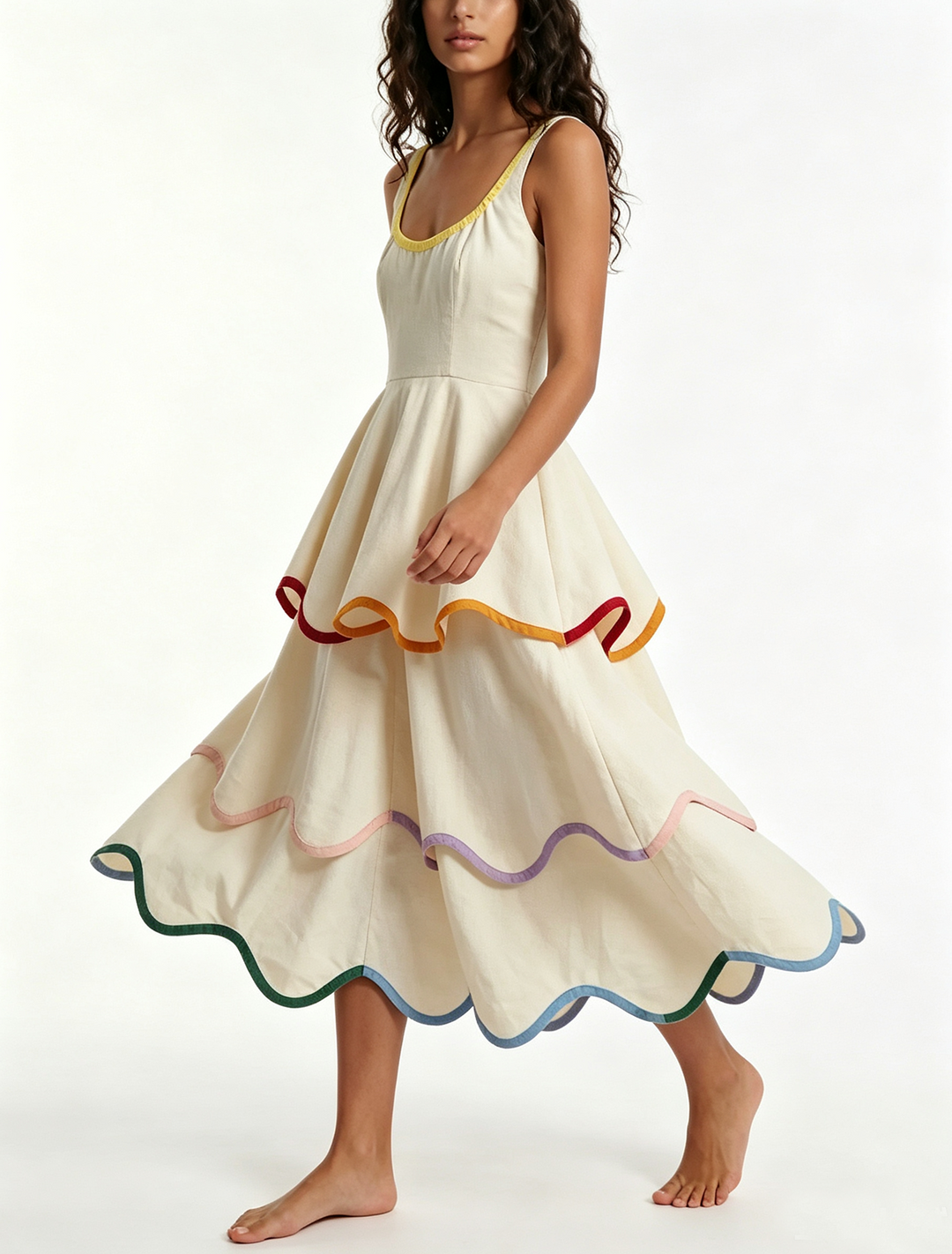 Boho-style women's white tiered maxi dress with colorful rainbow trim. A charming sleeveless summer and party dress.