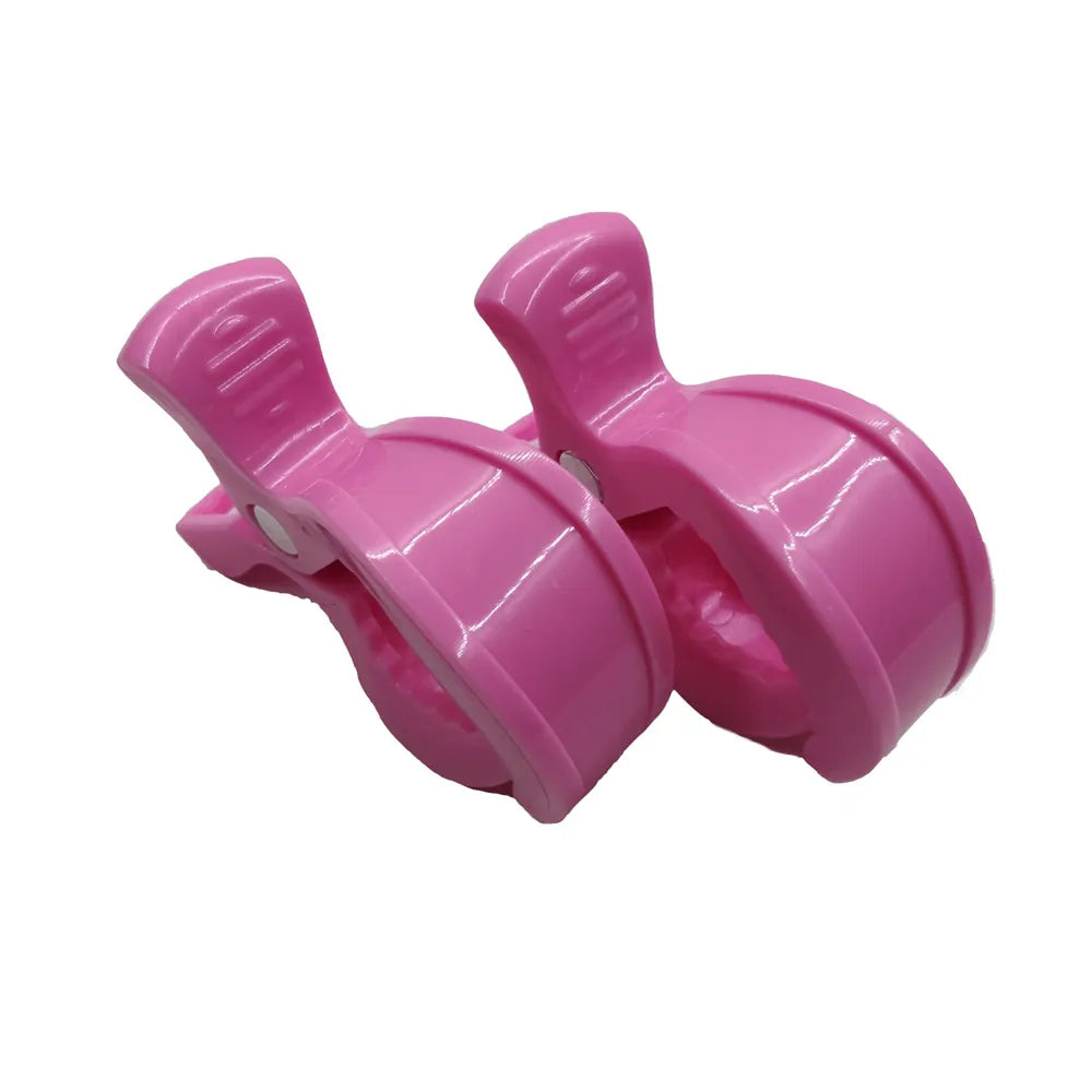 Practical pram pegs: two white clips for securing baby toys or blankets to stroller
