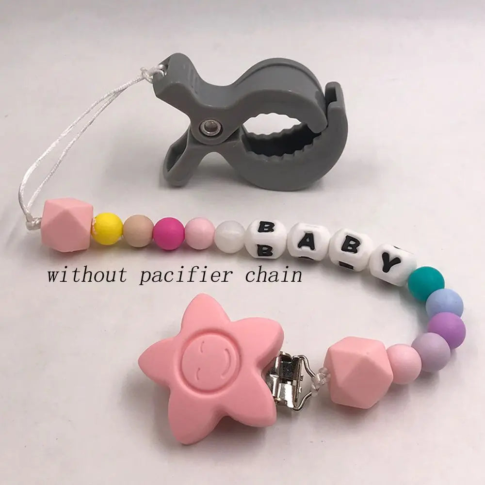 Versatile baby accessory: two stroller clip hooks for securing blankets and toys