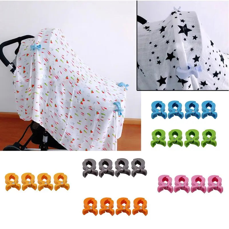 Parenting solution: white stroller clips reliably holding a baby's blanket in place