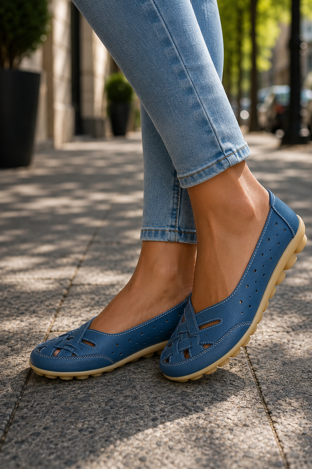 Slip-on white ballet flats for women, offering everyday comfort & versatile style. Perfect casual footwear.