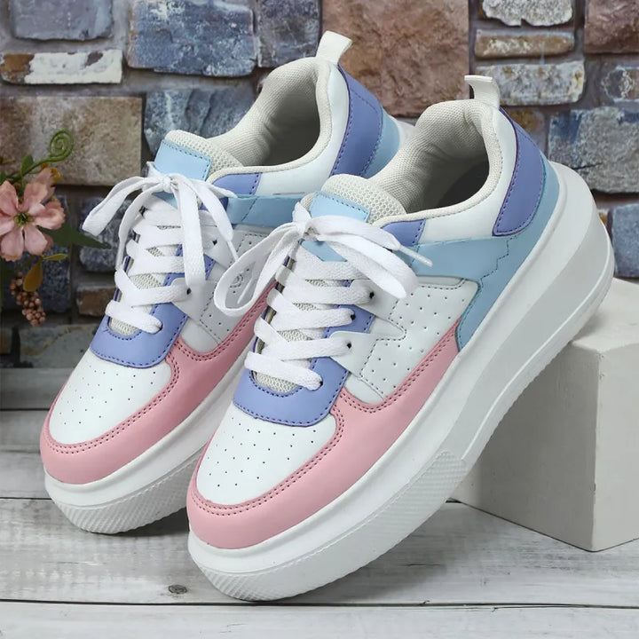 Street style women's platform sneakers, white, featuring lace-up and perforated detailing for a trendy look.