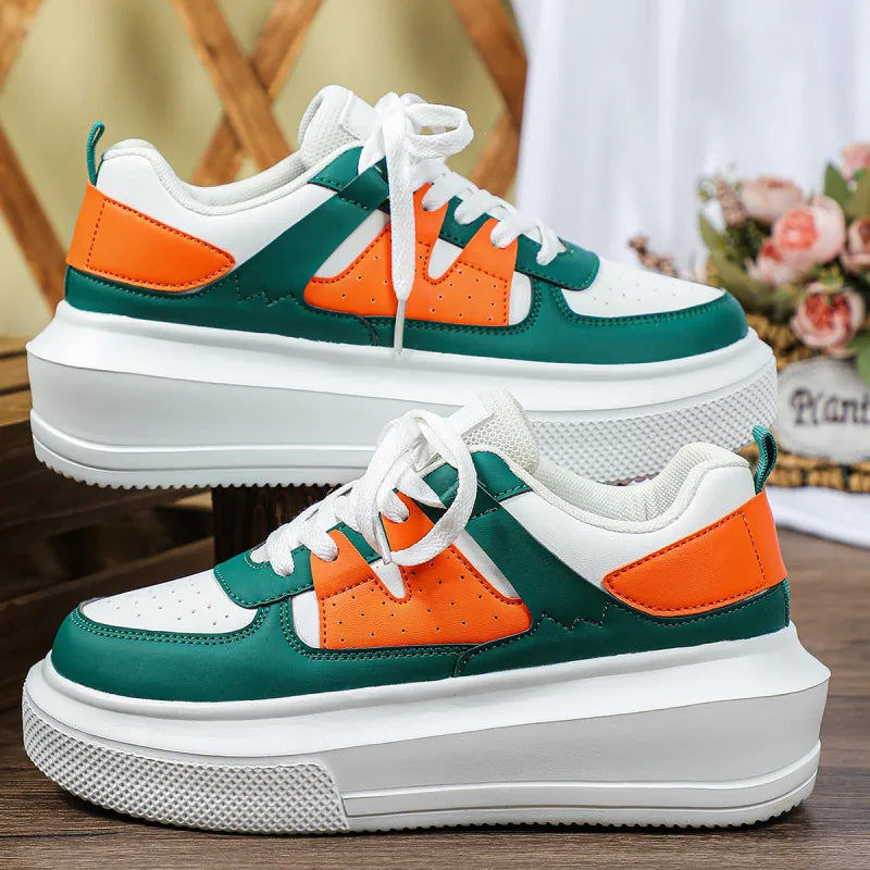 Elevated white women's platform sneakers with chic perforated design and secure lace-up closure.